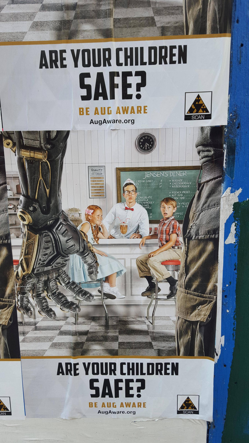 Illustration for article titled Deus Ex Propaganda Posters Spotted In The Wild